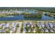 Beautiful aerial view of the community, lake, walking trails, and colorful homes at 2931 Waterleaf Rd, Johns Island, SC 29455