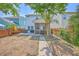 Expansive backyard with a screened porch, dining set, grill, and fenced yard at 2931 Waterleaf Rd, Johns Island, SC 29455