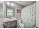 Bathroom featuring a butterfly shower curtain, sink with vanity, and a toilet at 2931 Waterleaf Rd, Johns Island, SC 29455