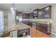Spacious kitchen with a granite island, stainless steel appliances, and ample cabinet space at 2931 Waterleaf Rd, Johns Island, SC 29455