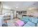 Open concept living room with kitchen and dining views, a ceiling fan, and lots of seating at 2931 Waterleaf Rd, Johns Island, SC 29455