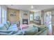 Cozy living room with a fireplace, comfortable seating, and natural light at 2931 Waterleaf Rd, Johns Island, SC 29455