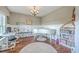 Bright and spacious home office featuring a white piano and ample workspace at 2931 Waterleaf Rd, Johns Island, SC 29455
