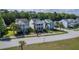 Street view of vibrant homes with palm trees, landscaped yards, and charming curb appeal at 2931 Waterleaf Rd, Johns Island, SC 29455
