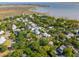 Expansive aerial view of a waterfront community with charming houses and marsh views at 301 Center St, Mount Pleasant, SC 29464
