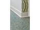 Bathroom flooring with blue penny tile and white trim at 301 Center St, Mount Pleasant, SC 29464