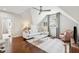 Charming living room with a cozy sofa, stylish decor, and hardwood floors at 301 Center St, Mount Pleasant, SC 29464