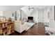 Bright living room featuring hardwood floors, comfortable seating, and ample natural light at 301 Center St, Mount Pleasant, SC 29464