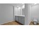 Bathroom featuring a double vanity, wood look flooring, and a toilet at 301 Watersglen Dr, Summerville, SC 29486