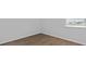 This bedroom features laminate flooring, bright natural light, and neutral paint at 301 Watersglen Dr, Summerville, SC 29486