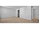 Spacious bedroom with neutral carpet, and a doorway leading to an adjoining space at 301 Watersglen Dr, Summerville, SC 29486
