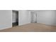 Large bedroom with neutral carpet and multiple doorways leading to other rooms at 301 Watersglen Dr, Summerville, SC 29486