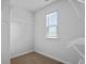 Walk-in closet featuring built-in shelving and a window for natural light at 301 Watersglen Dr, Summerville, SC 29486