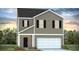 Charming two-story home featuring a two-car garage, black shutters, and manicured landscaping at 301 Watersglen Dr, Summerville, SC 29486