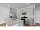 Modern kitchen with stainless steel appliances, granite countertops, and ample cabinet space at 301 Watersglen Dr, Summerville, SC 29486