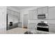 Kitchen island with stainless appliances and walk-in pantry in an open concept layout at 301 Watersglen Dr, Summerville, SC 29486