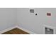 Clean, white laundry room with hookups and space for appliances, ready for customization at 301 Watersglen Dr, Summerville, SC 29486
