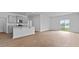 Spacious living room adjacent to the open kitchen and featuring hardwood floors at 301 Watersglen Dr, Summerville, SC 29486