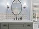 Remodeled bathroom with neutral cabinets, designer tile backsplash, and updated hardware at 3052 Seabrook Island Rd, Seabrook Island, SC 29455
