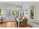 Dining area featuring modern lighting and views of the backyard at 3052 Seabrook Island Rd, Seabrook Island, SC 29455