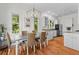Bright dining room features hardwood floors and a modern light fixture at 3052 Seabrook Island Rd, Seabrook Island, SC 29455