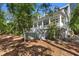 This charming house boasts a large covered porch, situated on a wooded lot, perfect for enjoying the outdoors at 3052 Seabrook Island Rd, Seabrook Island, SC 29455
