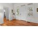 Bright foyer features natural light, wood floors, and white trim at 3052 Seabrook Island Rd, Seabrook Island, SC 29455