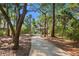 Secluded home on wooded lot accessed by a long private driveway at 3052 Seabrook Island Rd, Seabrook Island, SC 29455