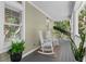 Relaxing porch with rocking chairs for enjoying the outdoors at 3052 Seabrook Island Rd, Seabrook Island, SC 29455