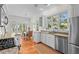 Kitchen features granite countertops, stainless steel appliances and eat-in dining area at 3052 Seabrook Island Rd, Seabrook Island, SC 29455