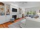 Spacious living room with fireplace, built-ins, and stylish décor at 3052 Seabrook Island Rd, Seabrook Island, SC 29455