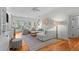 Open living room boasts hardwood floors and comfortable seating area at 3052 Seabrook Island Rd, Seabrook Island, SC 29455