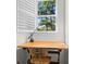 Study nook is illuminated by natural light, and features a view of the beautiful canopy of trees at 3052 Seabrook Island Rd, Seabrook Island, SC 29455