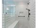 Walk-in shower with designer tile, built-in seat, and updated fixtures at 3052 Seabrook Island Rd, Seabrook Island, SC 29455