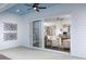 Inviting covered patio showcasing a seamless transition to the open-concept living space through sliding glass doors at 328 Trailmore Ln, Summerville, SC 29486