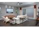 Comfortable living room with a sliding glass door, hardwood floors, a TV, and stylish furniture at 336 Trailmore Ln, Summerville, SC 29486