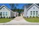 A street view showcasing a variety of attractive single-Gathering homes in a residential neighborhood at 336 Trailmore Ln, Summerville, SC 29486