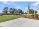 Spacious back yard features a lawn, landscaping and lush trees at 4000 Saltwater Cir, Johns Island, SC 29455