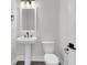 Elegant powder room features a pedestal sink and modern fixtures at 4000 Saltwater Cir, Johns Island, SC 29455