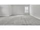 Spacious bedroom with neutral paint, carpet, and natural light from a window at 4000 Saltwater Cir, Johns Island, SC 29455