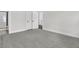 Open bedroom with light walls and a view into an adjacent bathroom at 4000 Saltwater Cir, Johns Island, SC 29455