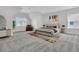 Cozy bedroom with neutral colored walls, a patterned rug, and ample natural light at 4000 Saltwater Cir, Johns Island, SC 29455
