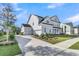 Two-story home with a two car garage, long driveway, manicured lawn and elegant curb appeal at 4000 Saltwater Cir, Johns Island, SC 29455