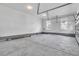 Spacious two car garage with high ceilings and concrete floors at 4000 Saltwater Cir, Johns Island, SC 29455