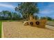 Community playground featuring a wooden boat play structure with safety mulch at 4000 Saltwater Cir, Johns Island, SC 29455