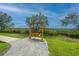 Scenic outdoor view featuring a wooden swing offering peaceful relaxation with a picturesque marsh backdrop at 4000 Saltwater Cir, Johns Island, SC 29455
