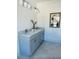 Modern bathroom with a double vanity, marble countertops, and stylish fixtures offers luxury at 405 Oak Hammock Ct # 49, Johns Island, SC 29455
