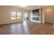 Open living room featuring a modern fireplace with sleek tv wall mount and sliding glass door to back patio at 408 Fox Sparrow Ct, Summerville, SC 29486