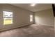 Spacious main bedroom featuring two windows for natural light at 408 Fox Sparrow Ct, Summerville, SC 29486