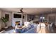 Inviting open-concept living room featuring a cozy fireplace, modern decor, and abundant natural light at 409 Oak Hammock Ct # 50, Johns Island, SC 29455